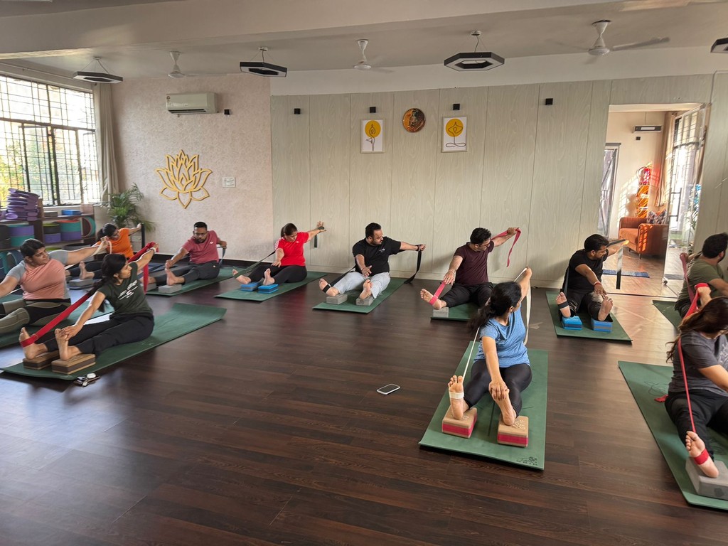 A Yin yoga class using straps and blocks at the Zelosity studio